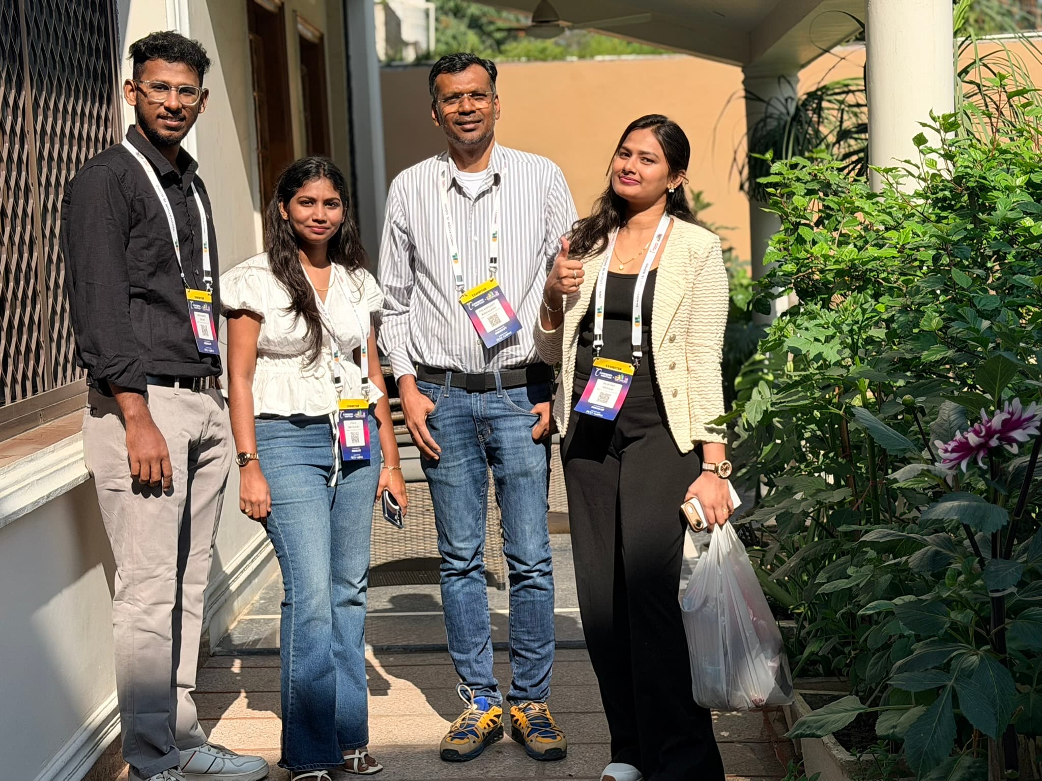 LuMay AI team engaging visitors at Booth P100